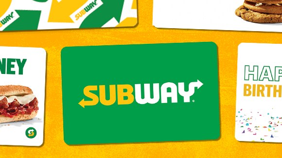 Subway® gift cards lying flat on a yellow surface.